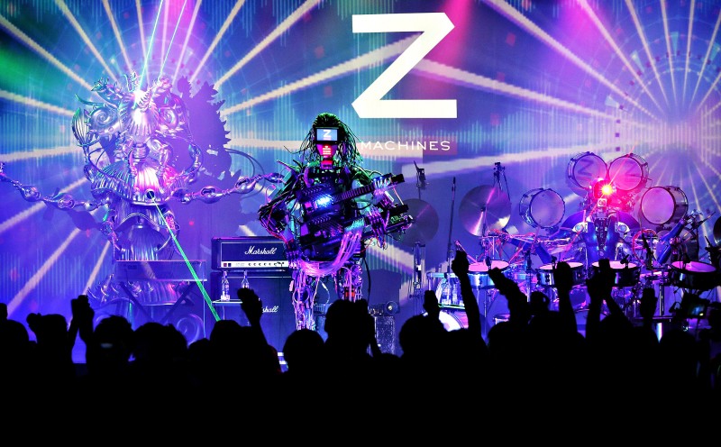 Members of the robot rock band Z-Machines, guitarist Mach, keybo